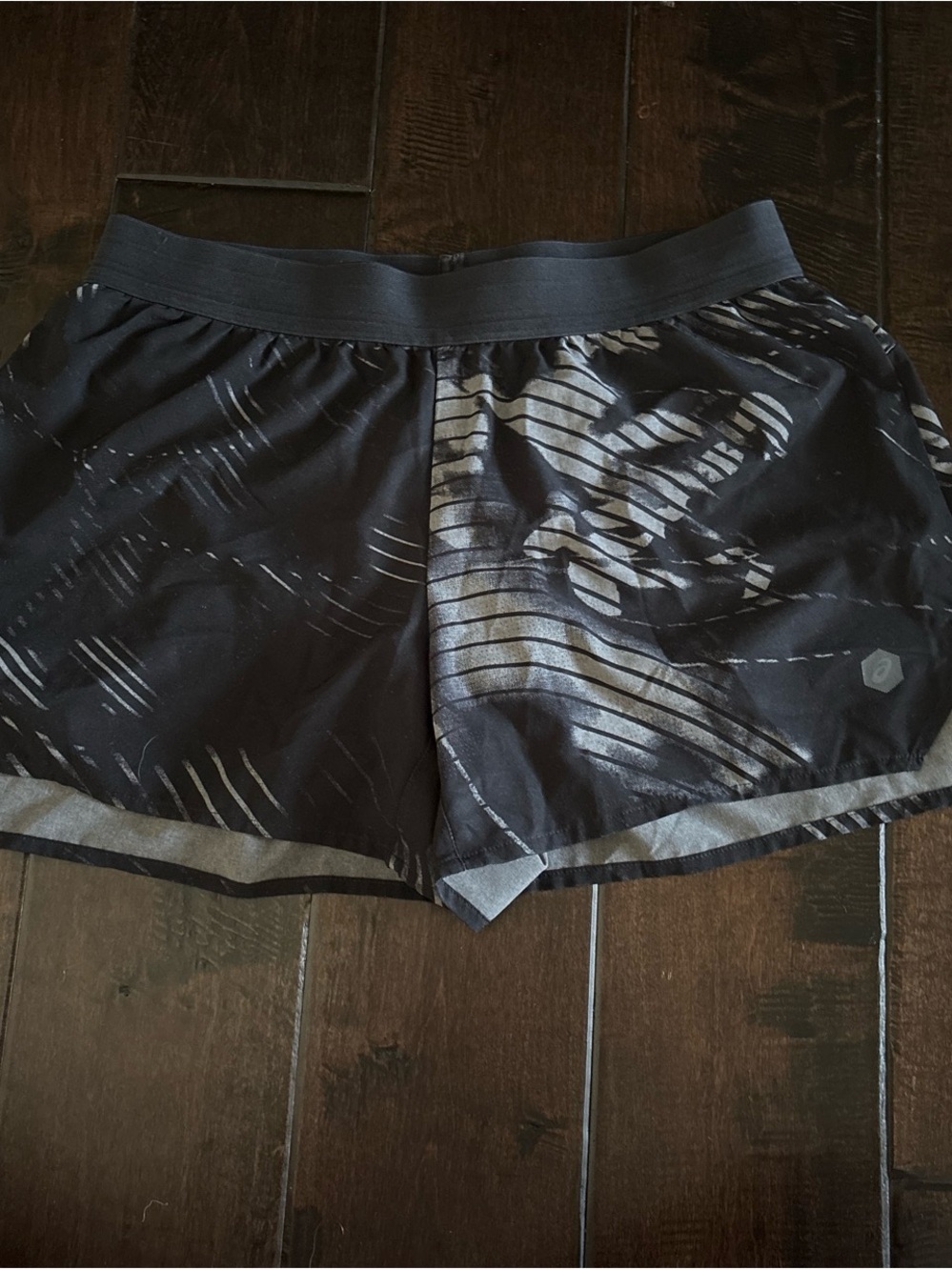 Asics Black Athletic Shorts with Subtle Gray Print